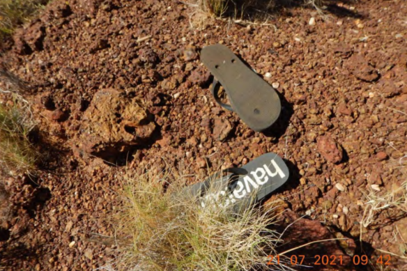 Piping, black plastic poking through the ground and a pair of thongs were among the waste left around the sites. 