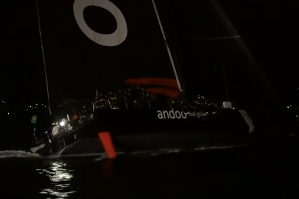 Andoo Comanche enters the harbour to claim line honours.