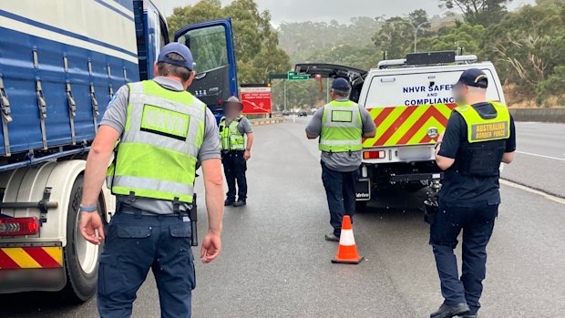 Border force officer targeting unlawful freight drivers during a nationwide crackdown.