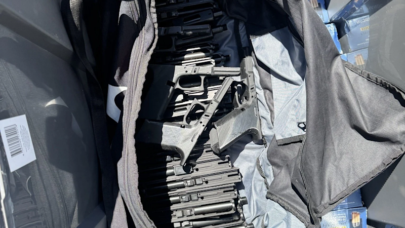 Dozens of 3D-printed guns allegedly found in car, Brisbane men arrested