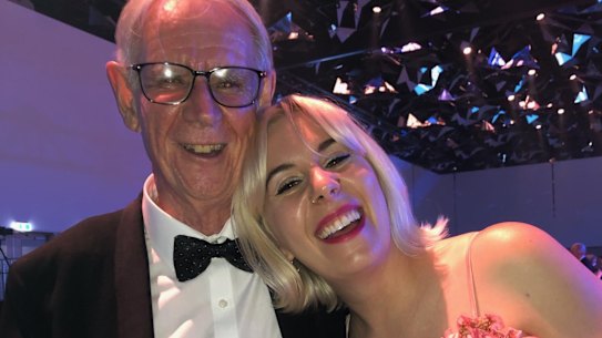 With daughter Jess, holding his Walkley award for best short feature, “Counting down the days in God’s waiting room”, which appeared in Good Weekend in 2018.