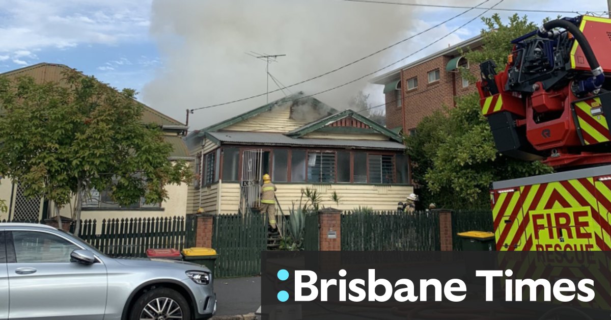 Man rushed to hospital after house fire in Brisbane’s inner north