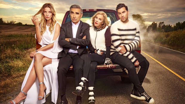 Annie Murphy as Alexis, Eugene Levy as Johnny, Catherine O'Hara as Moira and Daniel Levy as David in Schitt's Creek.