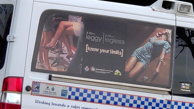 The Queensland government campaign image on a police vehicle at a depot in Alderley.