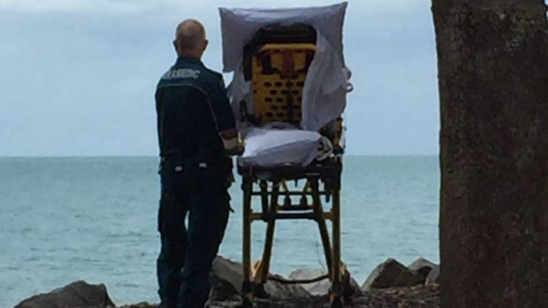 The photo of Hervey Bay paramedic Graeme Cooper, taken by colleague Danielle Kellam, touched hearts around the world.