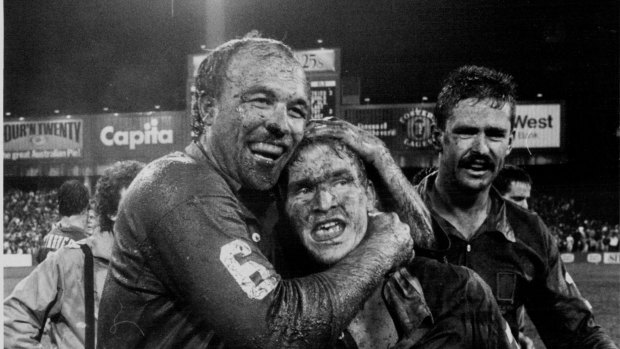 Wally Lewis and Allan Langer embrace after a game in 1987.