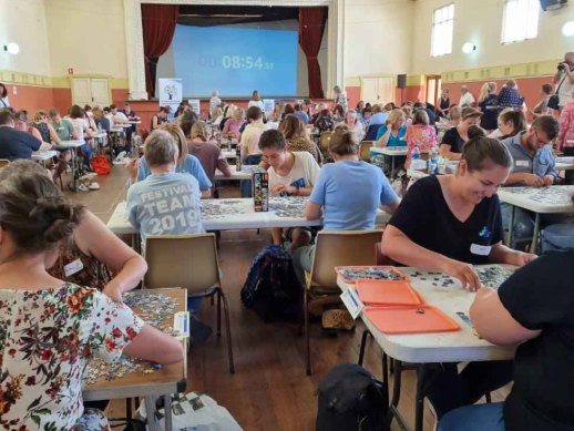 Competitors in the Western Australian jigsaw puzzle competition in January 2021.