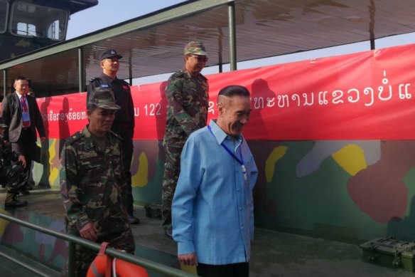 Zhao Wei, head of the Kings Romans Group, at a meeting of regional law enforcement officials.