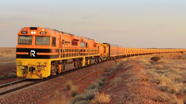 Aurizon will operate trains on rail tracks stretching from South Australia north to Darwin after buying One Rail.