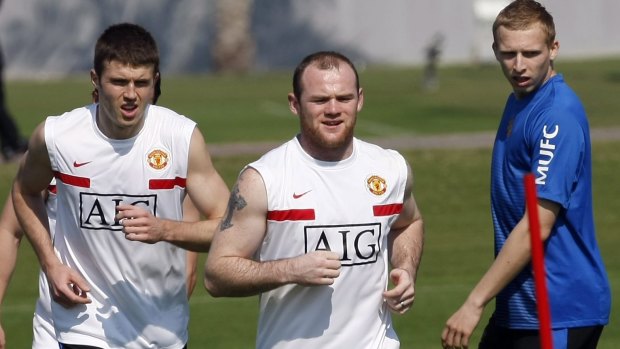 Ritchie De Laet (right) in his Manchester United days with Michael Carrick and Wayne Rooney.