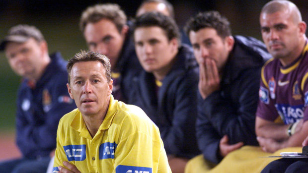 On the bench: The then Broncos' performance director Craig Bellamy watches the 'baby Broncos' against the Tigers.