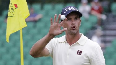 Adam Scott salutes after his back nine eagle.