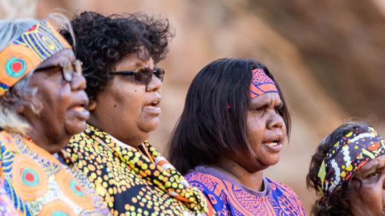 Members of the Central Australian Aboriginal Women’s Choir will perform a new version of the national anthem that they're happy to sing on Sunday at the Desert Song Festival. 