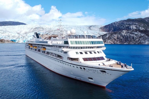The Villa Vie Odyssey  ship in front of glaciers. 