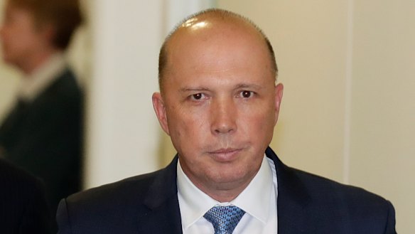 Peter Dutton exits the partyroom meeting.