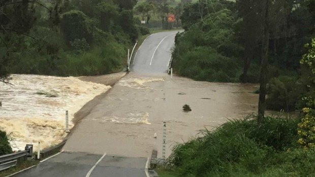Rain leaves a deluge that blocks roads in the Gold Coast hinterland
