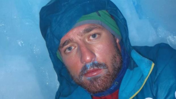 Terry Harch sheltering in a narrow crevasse awaiting rescue from Mount Tasman in 2013.