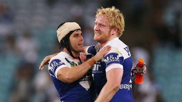 Michael Ennis and James Graham of the Bulldogs in 2014.