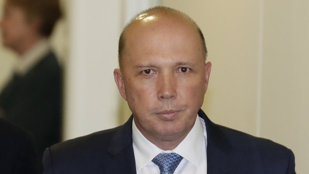 Peter Dutton exits the partyroom meeting.