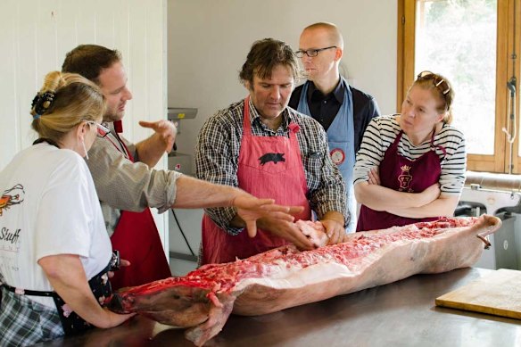Break down a whole hog at La Tavola Marche.
