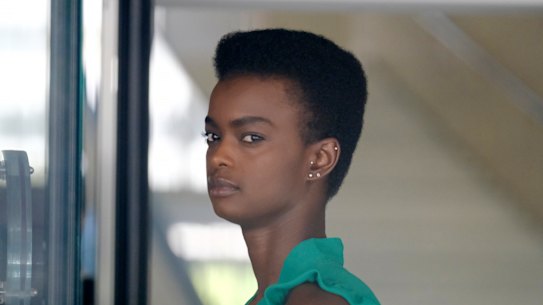 Australian-South Sudanese model Adau Mornyang checks in through security for her court case at the Federal Courthouse in downtown Los Angeles.