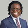 Lindian Resources owns the Kangankunde rare earths project in Malawi. Former chairman Asimwe Kabunga, inset, is suing the rare earths miner.