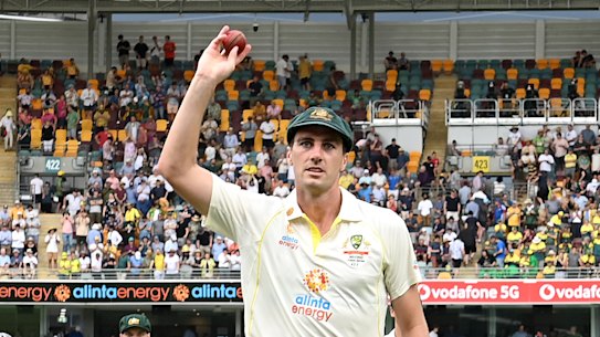 Pat Cummins celebrates his five-wicket haul.