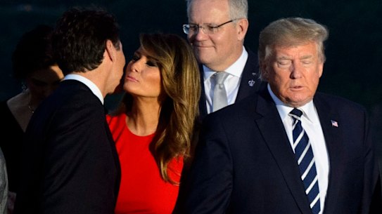 Canadian Prime Minister Justin Trudeau, left, greets Melania Trump as she arrives for a family photo with US President Donald Trump, during the G7 Summit in Biarritz, France in 2019.
