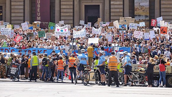 Students protesting against government inaction on climate change, in Melbourne on Friday.