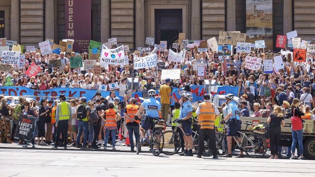 Students protesting against government inaction on climate change, in Melbourne on Friday.