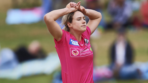 Injury fears: Sydney Sixers all-rounder Ellyse Perry during the Women's Big Bash League loss to the Renegades at Drummoyne Oval on Sunday.