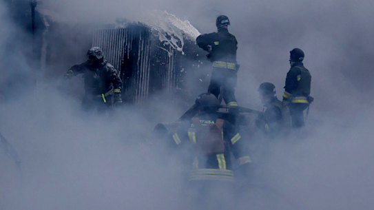 Firefighters put out the fire following a Russian missile attack on the country’s energy system in Dnipropetrovsk region, Ukraine, on Christmas Day.