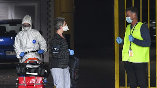 A guest and staff at Rydges Hotel in Carlton in April.