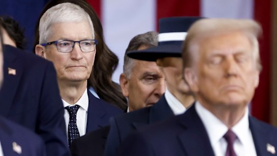 Tim Cook attends Donald Trump’s inauguration at the US Capitol in January.