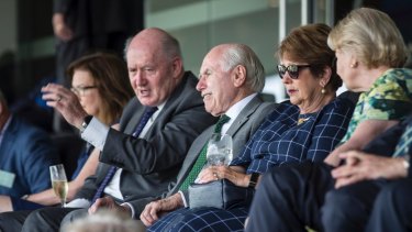 Governor-General Sir Peter Cosgrove sits alongside former prime minister John Howard at the SCG. 