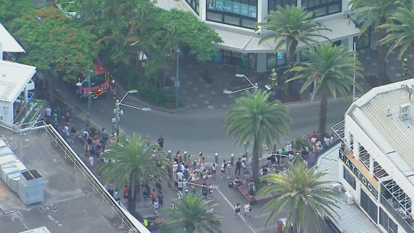 Onlookers after the mysterious explosion in Surfers Paradise.