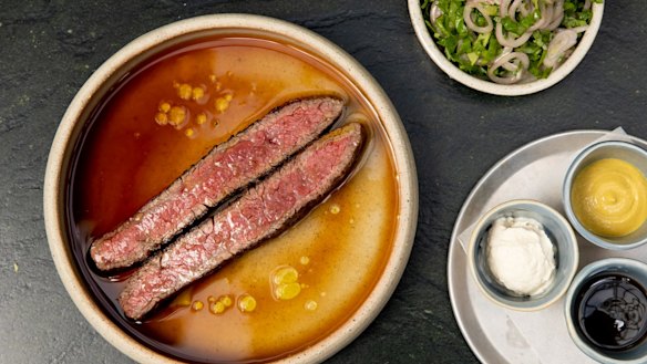 Wagyu flank with condiments and salad.
