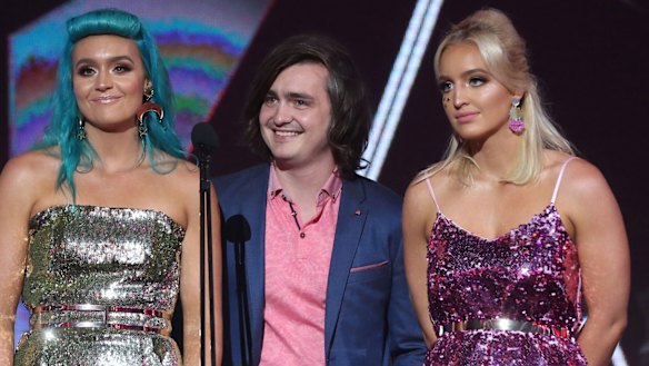 George Sheppard, centre, with sisters Amy and Emma. 
