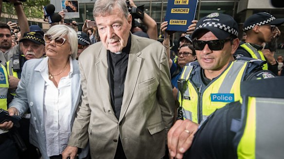 Cardinal George Pell leaving the County Court where was found guilty of historic sexual offenses.