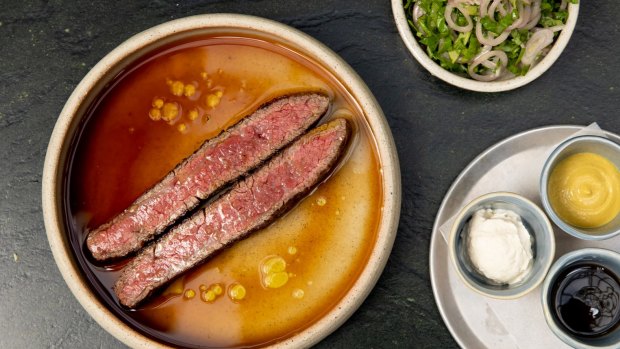 Wagyu flank with condiments and salad.