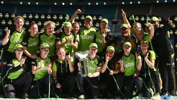 Champions: Sydney Thunder celebrate their WBBL01 title.