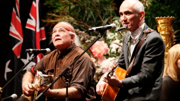 Kev Carmody and Paul Kelly sing <i>From Little Things Big Things Grow</i> at Gough Whitlam's funeral.