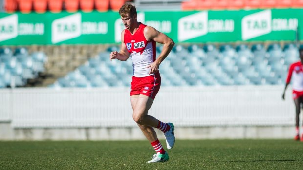 Injury after injury: Alex Johnson playing in the NEAFL last year.
