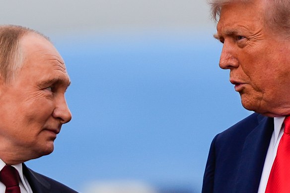 Russia’s President Vladimir Putin with US President Donald Trump in Alaska last month. 