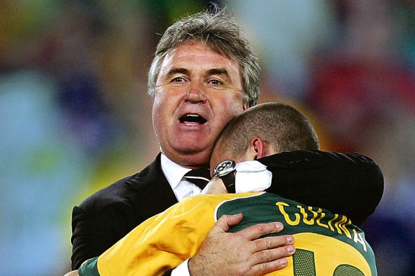 Guus Hiddink and Tim Cahill celebrate the Socceroos' drought-breaking qualification for the 2006 World Cup.