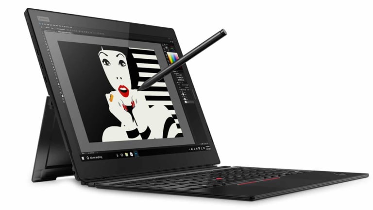 The Thinkpad's stylus does not magnet to the side of the device like the Surface's does.