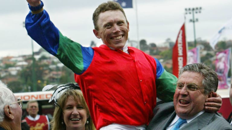 Dream: Whitby celebrates with jockey Chris Munce after winning the 2004 Cox Plate with Savabeel. 