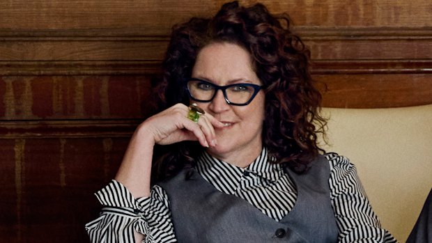 “Making this show felt like a good time to stop for a second and have a look at our system and the way it functions.” Annabel Crabb wears Zara waistcoat, pants and shirt. Christian Louboutin shoes (worn throughout). Her own jewellery (worn throughout).