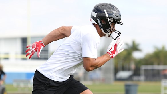 Adjusting to the playing equipment is all part of Holmes' journey.