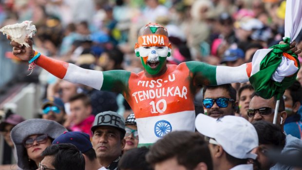 Colourful: Sudhir Gautam is an Indian supporter who travels the world supporting the Indian cricket team.